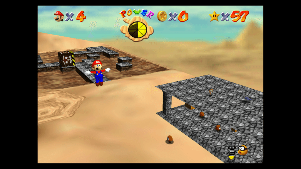 Os visuais de Super Mario 64 combinam melhor com o modo portátil e as texturas mais simples (como a areia) são as que envelheceram melhor. (Imagem: Reprodução)