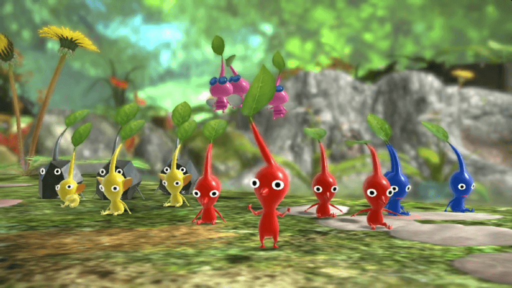 Senhoras e senhores, os cinco tipos de Pikmin encontrados durante a campanha de Pikmin 3 Deluxe. Não compareceram: brancos e roxos. (Imagem: Reprodução)